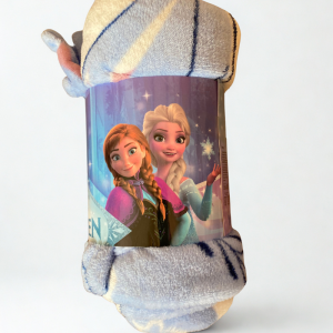 Manta infantil Frozen con Anna y Elsa de microfibra coralina.